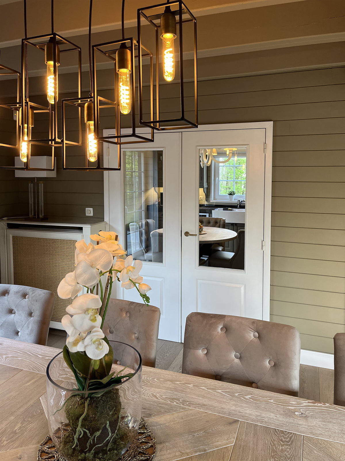 Cage pendant lights above the dining table - Residence, Overijse
