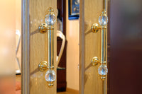 Clasica Door pull handles set 340mm on rosettes in interior - Bronces Mestre