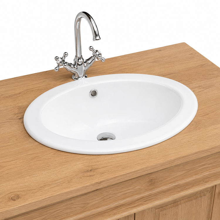 Close-up of oval ceramic basin with chrome cross-head tap on solid oak Hartwell vanity countertop