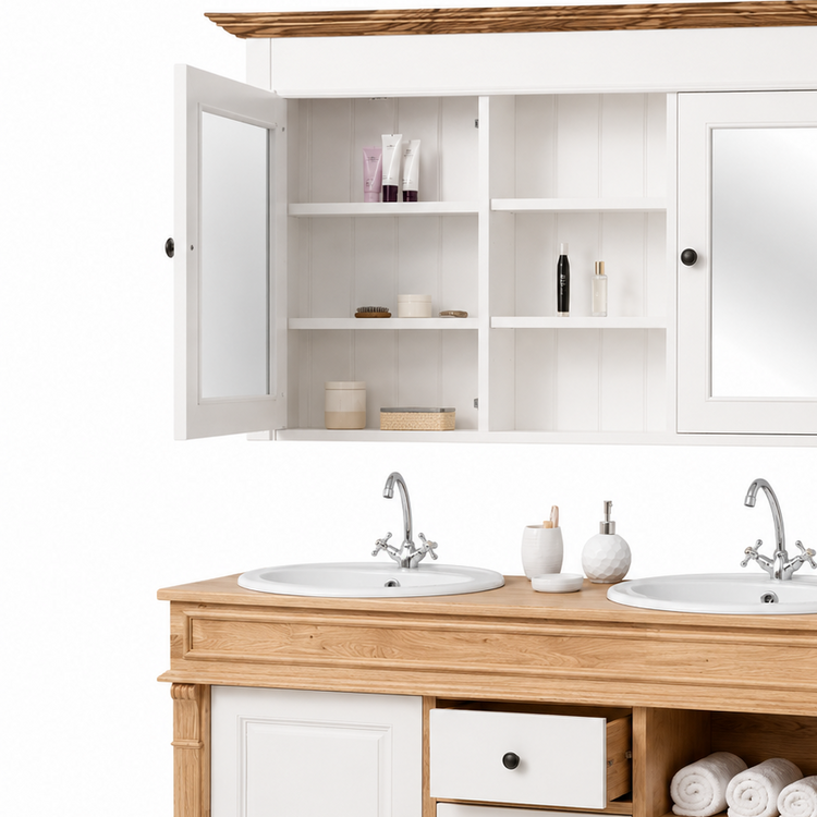 Open mirror-cabinet door of the white oak Hartwell set revealing shelves stocked with bathroom toiletries