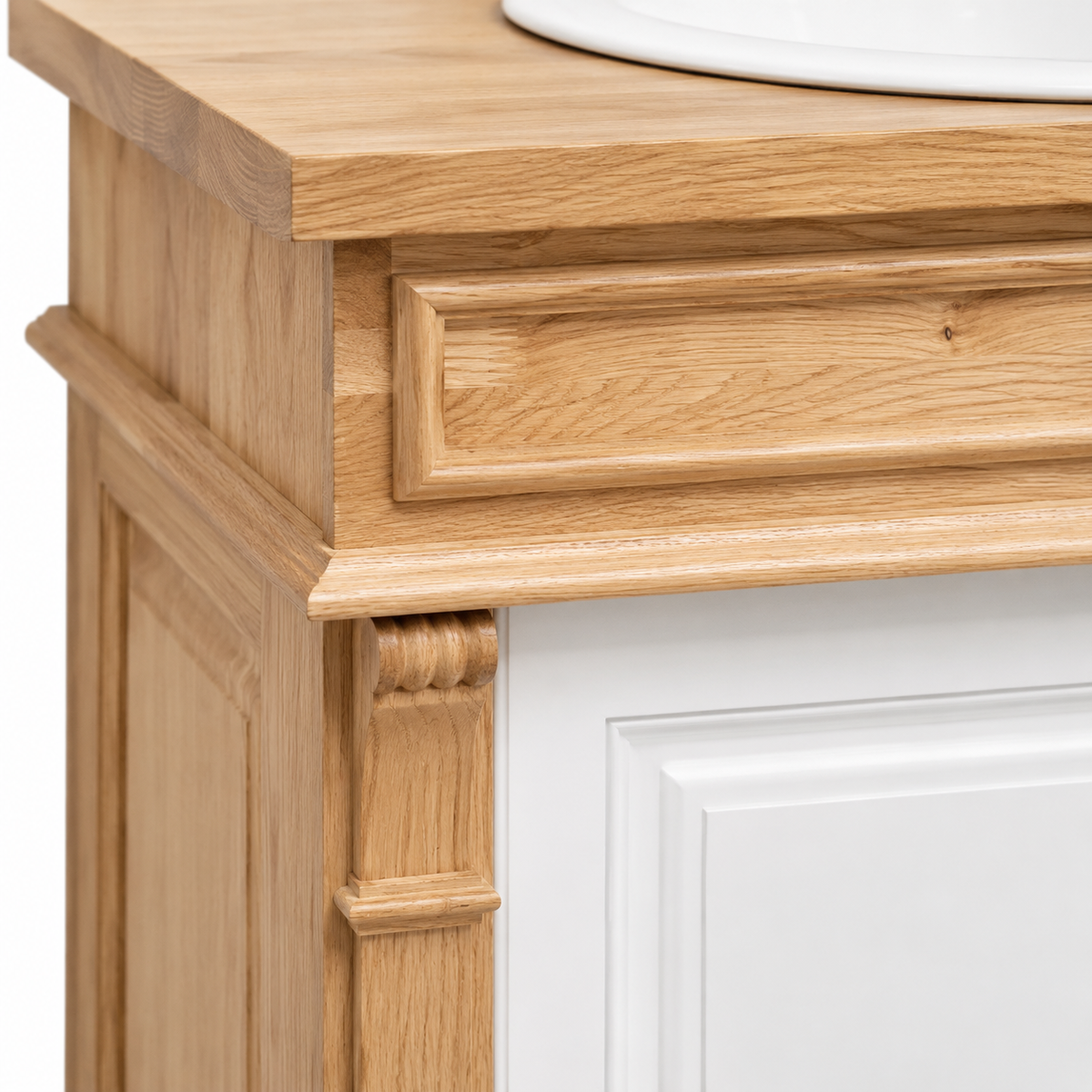 Close-up of the natural oak fluted pilaster and panelled white door on the Hartwell vanity