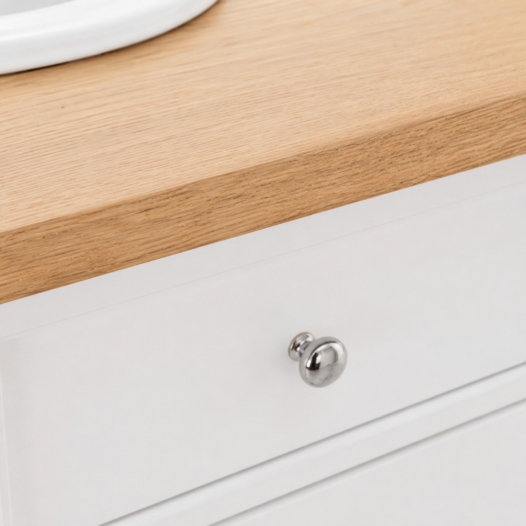 Detail of the solid oak countertop edge and white drawer with chrome knob, Hartwell vanity