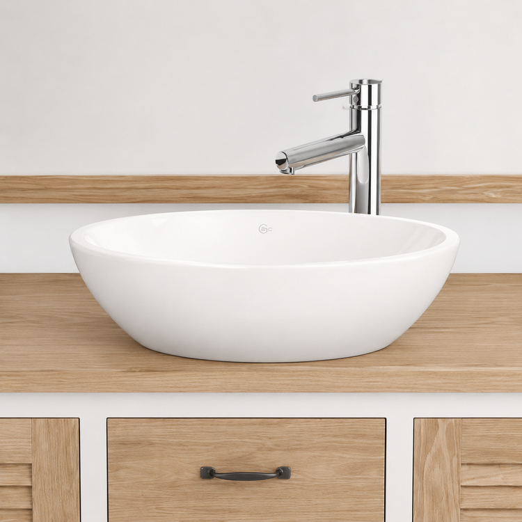 Close-up of white ceramic vessel sink and chrome faucet on the oak top of the Seabrook vanity