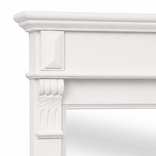 Close-up of the Baldo mirror crown moulding and carved block corbel in white painted pine