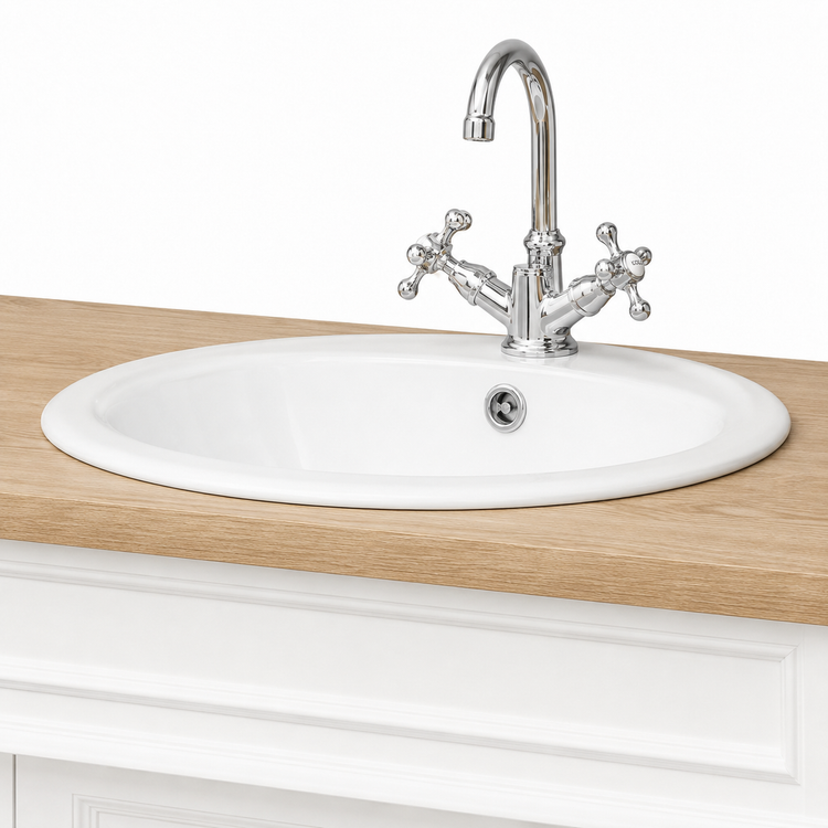 Close-up of the Marcoli vanity ceramic sink and chrome cross-handle tap on the solid oak top