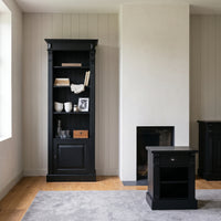 Bookcase Sarlat in black, in an interior, 71 x 39 x 197 cm