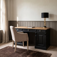 Desk Auxerre in black with oak top, in an interior, 140 x 70 x 78 cm