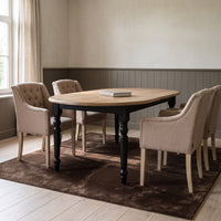 Dining Table Givry in black with oak top, in an interior, 180 x 120 x 78 cm
