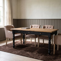 Dining Table Pommard in black with oak top, in an interior, 180 x 90 x 78 cm