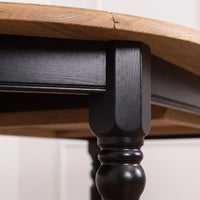 Dining Table Volnay in black with oak top, close-up of the finish and construction, 210 x 120 x 78 cm