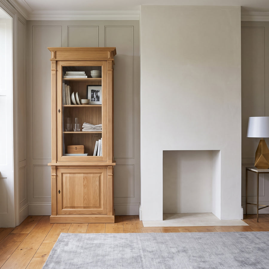 Display Cabinet Vezelay in solid oak, in an interior, 73 x 51 x 228 cm
