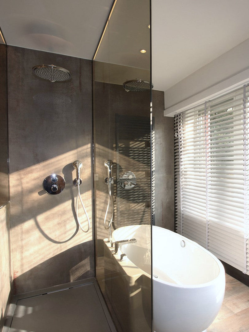 Modern bathroom with shower area and window blinds