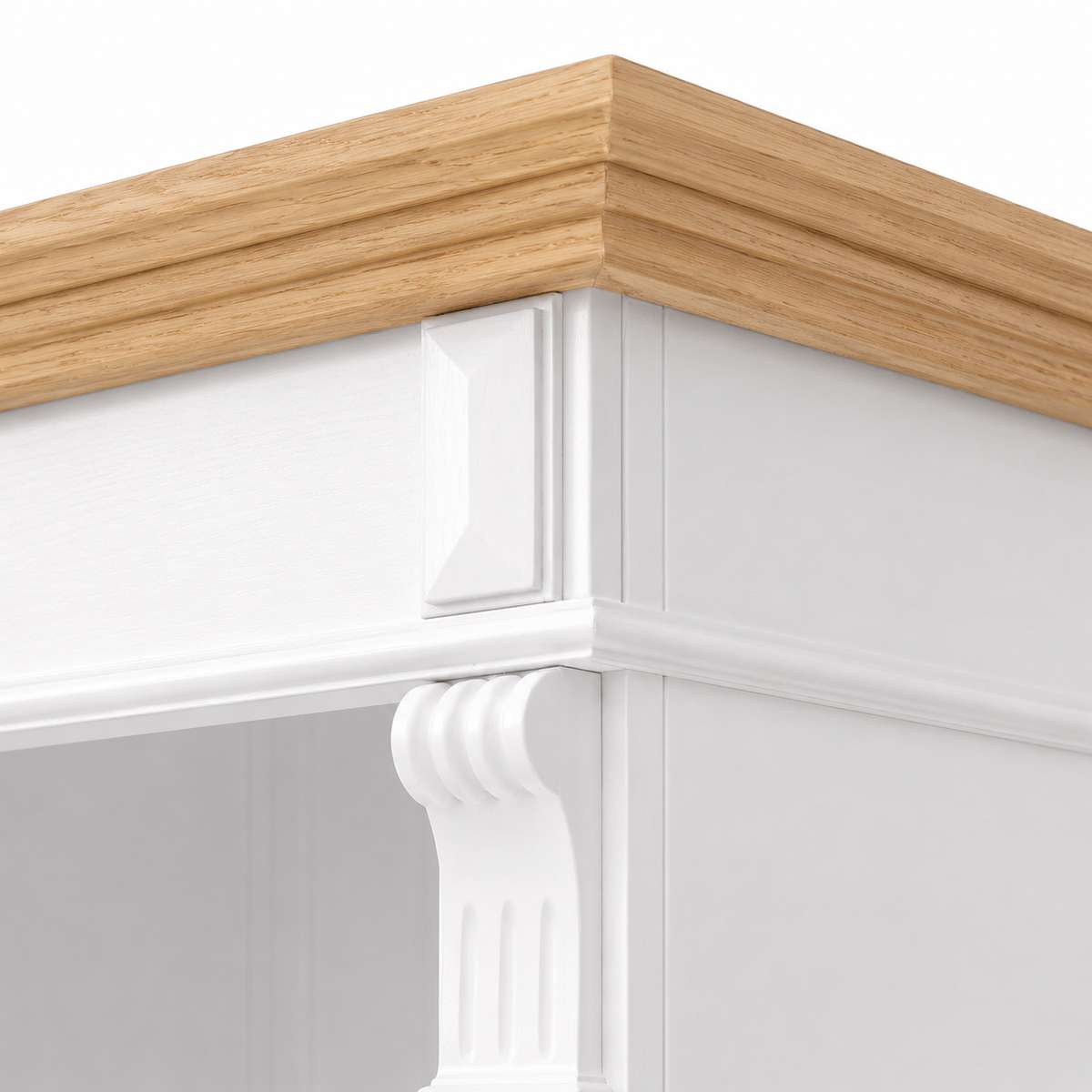 Close-up of natural oak top cornice and carved white capital detail on the Westcott bathroom cabinet