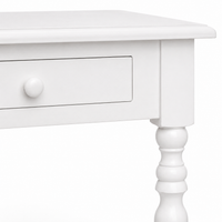 Close-up of the white finish and detailing of the Auray desk