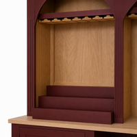 Close-up of the bordeaux finish and detailing of the Bandol bar cabinet