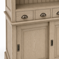 Close-up of the solid oak finish and detailing of the Bergerac bar cabinet