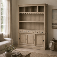 Bergerac bar cabinet in solid oak styled in a living room
