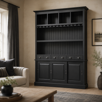 Bergerac bar cabinet in black styled in a living room drinks corner