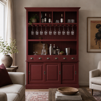 Bergerac bar cabinet in bordeaux styled in a living room