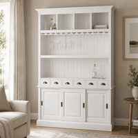 Bergerac bar cabinet in white styled in a living room drinks corner