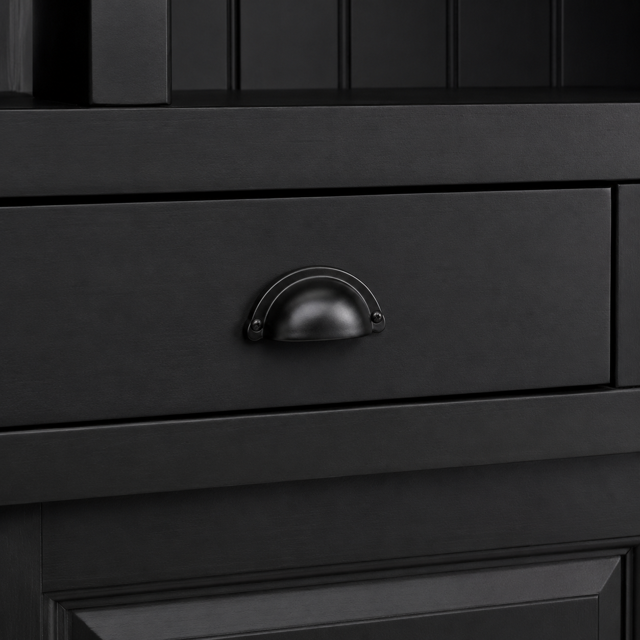 Close-up of the black finish and detailing of the Fronsac bar cabinet
