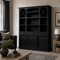Fronsac bar cabinet in black styled in a living room