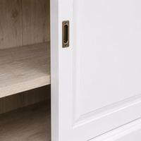 Close-up of the white finish and detailing of the Thouars bar cabinet