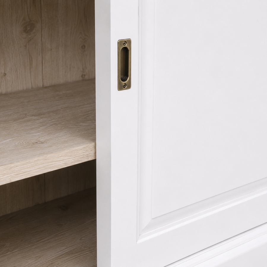 Close-up of the white finish and detailing of the Thouars bar cabinet