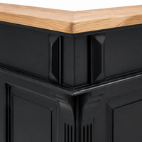 Close-up of the black finish and oak counter detailing of the Sauternes bar gallery