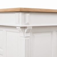 Close-up of the white finish and detailing of the Sauternes bar gallery