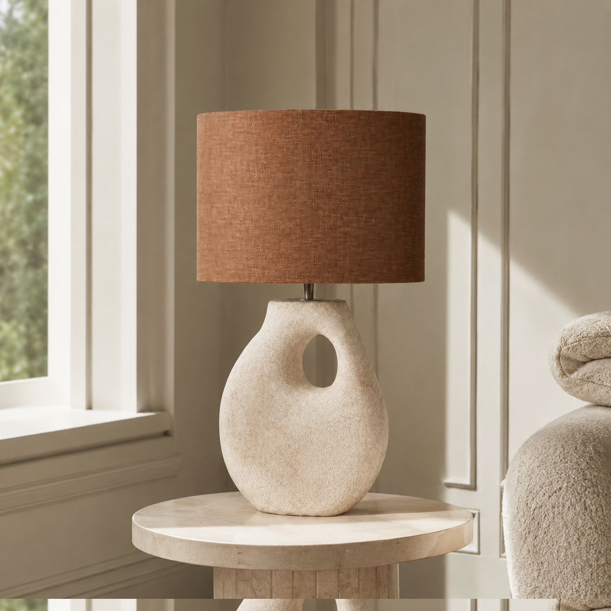 Table Lamp Boe 7909Z taupe sand styled in a modern luxury living room with natural window light, velvet textures and classic contemporary interior design by Marcottestyle