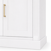 Close-up of brass door pull and fluted pilaster on white Arcade pine bookcase