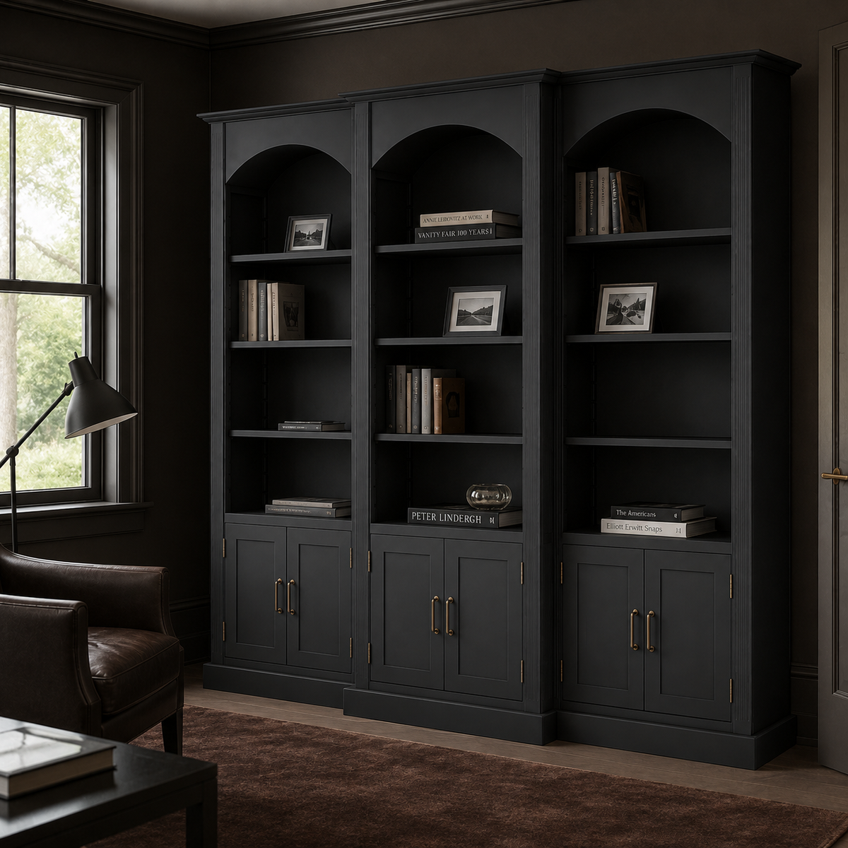 Transitional black Arcade triple arched bookcase styled in a living room with books and framed photos