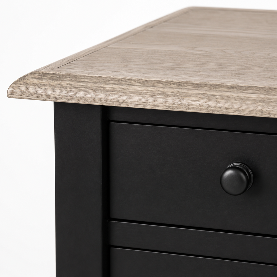 Close-up of the black paint and oak top finish and detailing of the Cahors nightstand