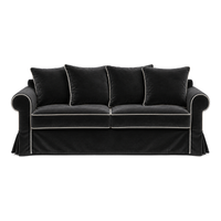 Castilliano country sofa in black velvet with white piping, front view