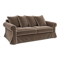 Castilliano country sofa in chocolate velvet with white piping, three-quarter view