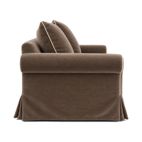 Castilliano country sofa in chocolate velvet with white piping, side view