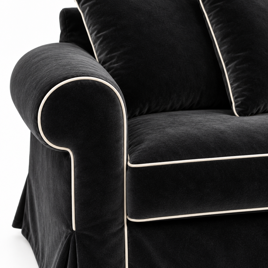 Castilliano country sofa in black velvet with white piping, velvet and piping detail