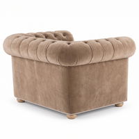 Chesterfield loveseat in beige velvet with white piping, rear view