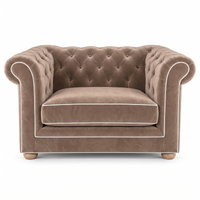 Chesterfield loveseat in beige velvet with white piping, front view