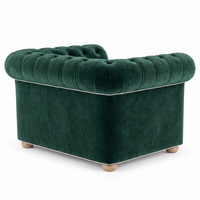 Chesterfield loveseat in forest green velvet with white piping, rear view