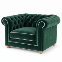 Chesterfield loveseat in forest green velvet with white piping, three-quarter view