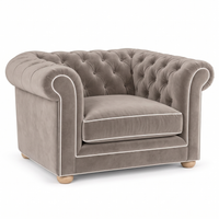 Chesterfield loveseat in greige velvet with white piping, three-quarter view