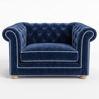 Chesterfield loveseat in navy blue velvet with white piping, front view