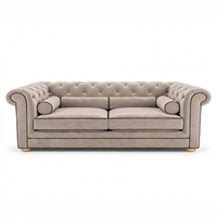 Chesterfield sofa in greige velvet with black piping, front view