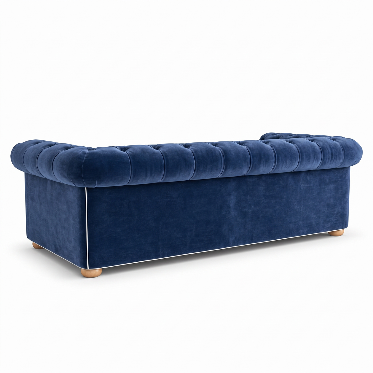 Chesterfield sofa in navy blue velvet with white piping, rear view