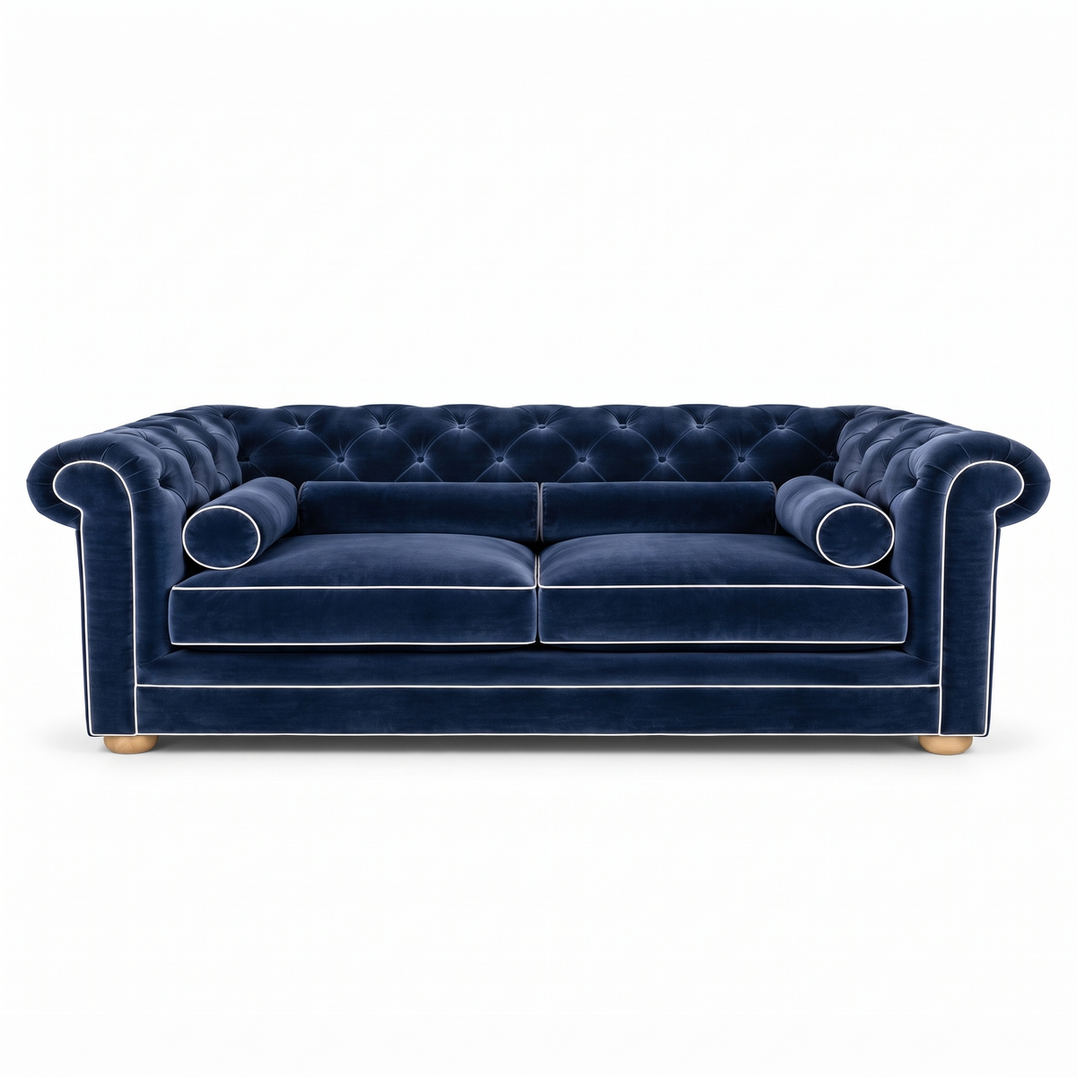 Chesterfield sofa in navy blue velvet with white piping, front view