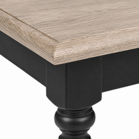 Close-up of the black paint and oak top detailing of the Pomerol coffee table