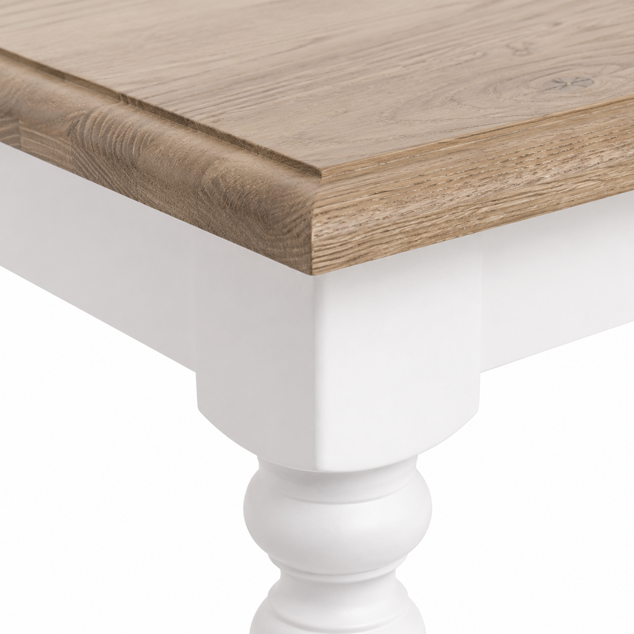 Close-up of the white paint and solid oak top detailing of the Pomerol coffee table