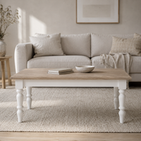 Pomerol coffee table in white with a solid oak top styled in a living room